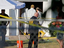 First responders work the scene of a shooting at the First Baptist Church of Sutherland Springs, Texas on Sunday, Nov. 5, 2017.