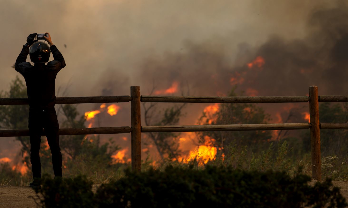 A wildfire rages along 241 and Santiago Canyon Rd. on Monday, Oct. 9, 2017 in Orange, CA.