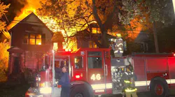 A house fire burns on Detroit's east side Wednesday night, one of only 54 in the city during the three-day period culminating with Halloween.