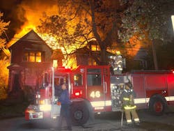 A house fire burns on Detroit&apos;s east side Wednesday night, one of only 54 in the city during the three-day period culminating with Halloween.
