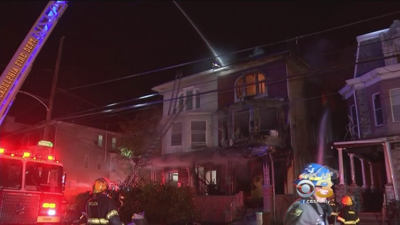 Philadelphia Police Officer Rescues Family from Rowhome Fire