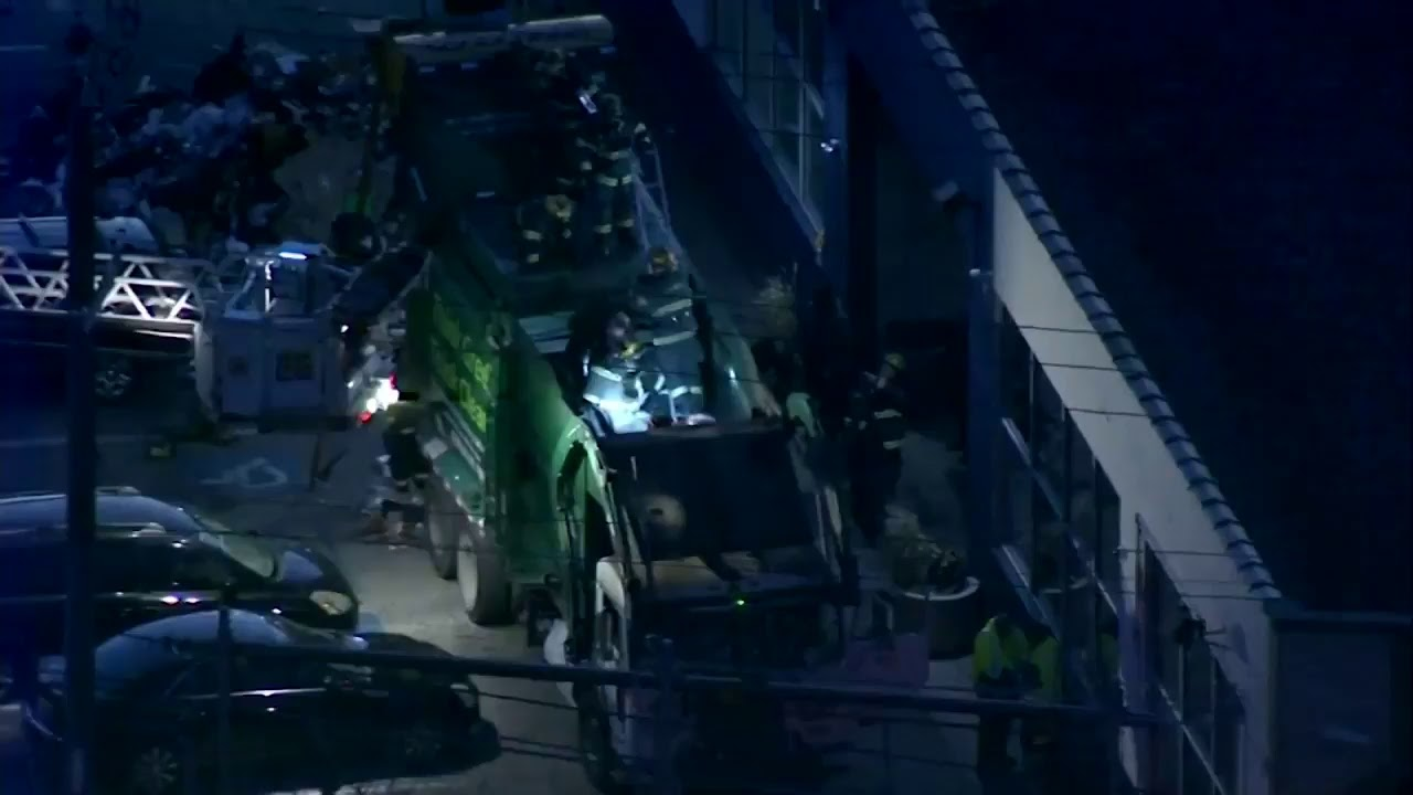Philadelphia FFs Rescue Homeless Man from Garbage Truck