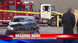 The flatbed damaged several police and fire vehicles in Syracuse.