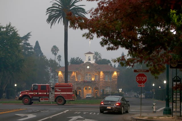 A fire apparatus passes Sonoma City Hall on the third day of Wine Country fires in October.