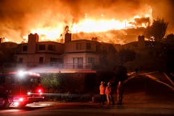 Hawaiian Gardens apartment complex on fire as brush fires move quickly with Santa Ana winds in Ventura, CA, on Tuesday. Hawaiian Gardens apartment complex on fire as brush fires move quickly with Santa Ana winds in Ventura, CA, on Tuesday.