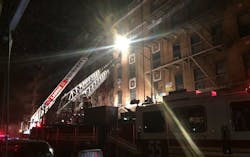 FDNY crews operate during a four-alarm fire at a Bronx apartment building that killed twelve people on Thursday night.