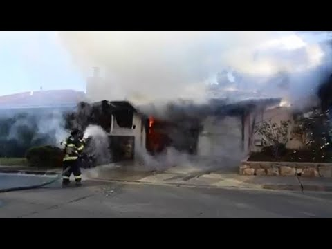 Watch CA Firefighters Contain House Fire