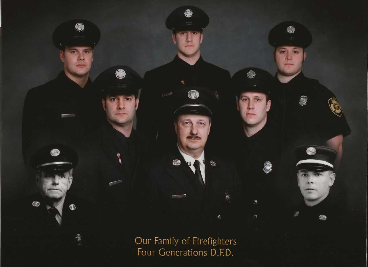 Members of the Wilson family of Detroit firefighters. Back row from left: Firefighters Bryan D. Wilson, Michael R. Wilson and Kristopher J. Fornash. Middle row from left: Lt. Harry P. Wilson, Capt. Harry M. Wilson and Sgt. Timothy J. Wilson. The black and white photos are of Lt. John E. Doll, left, and Lt. Emil C. Doll.