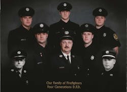 Members of the Wilson family of Detroit firefighters. Back row from left: Firefighters Bryan D. Wilson, Michael R. Wilson and Kristopher J. Fornash. Middle row from left: Lt. Harry P. Wilson, Capt. Harry M. Wilson and Sgt. Timothy J. Wilson. The black and white photos are of Lt. John E. Doll, left, and Lt. Emil C. Doll.