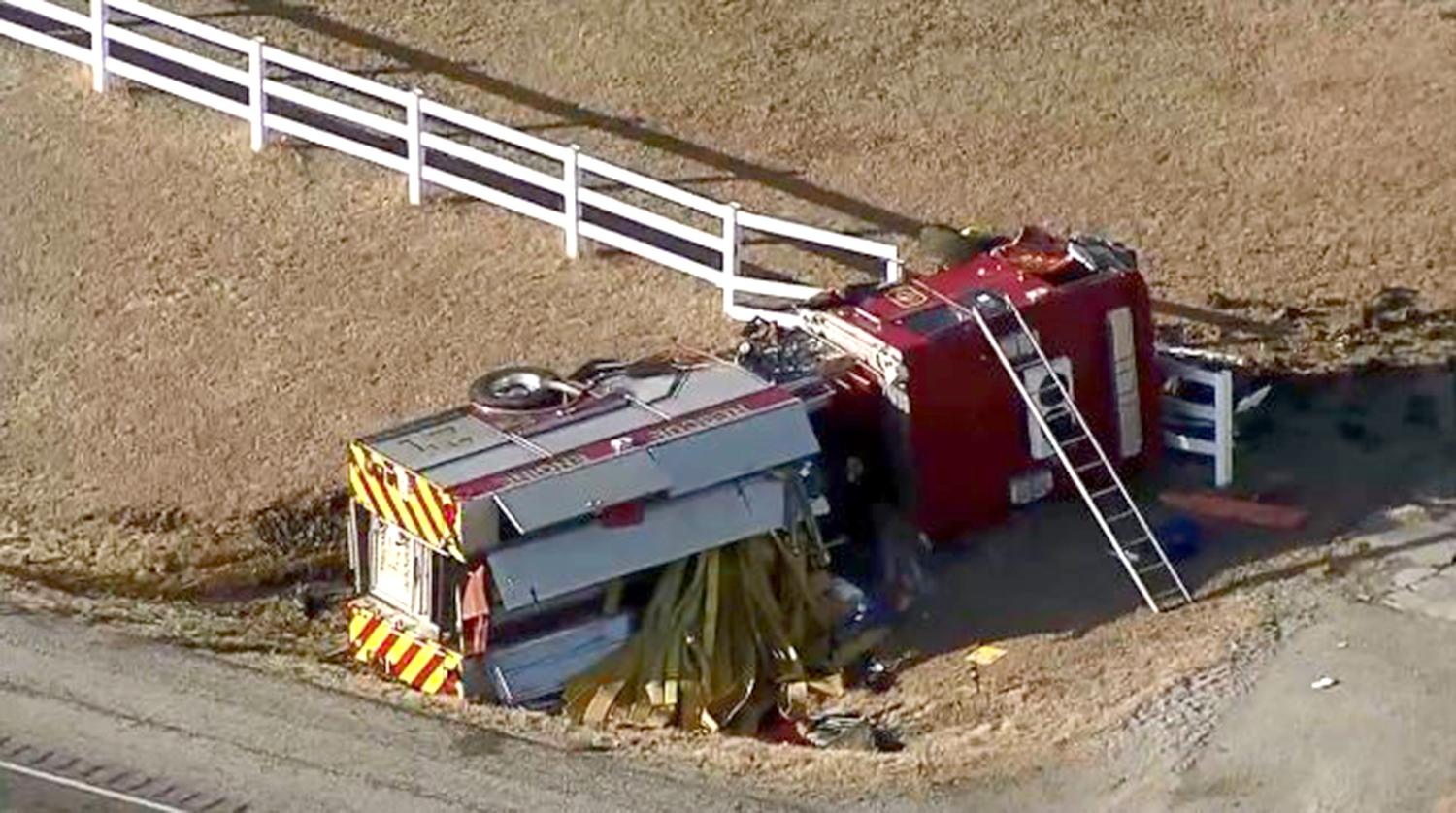 The Cash Volunteer Fire Department pumper was overturned in the crash.