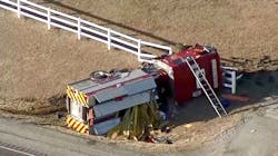 The Cash Volunteer Fire Department pumper was overturned in the crash. The Cash Volunteer Fire Department pumper was overturned in the crash.