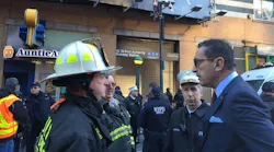 New York City Fire Commissioner Daniel Nigro, right, was among those on the scene Monday morning after a pipe bomb was detonated at the Port Authority bus terminal in midtown Manhattan.