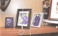 This image released by Miami Fire Rescue shows the lewd images and the noose that were left on a black firefighter's family photos and led to the firing of six firefighters. This image released by Miami Fire Rescue shows the lewd images and the noose that were left on a black firefighter's family photos and led to the firing of six firefighters.