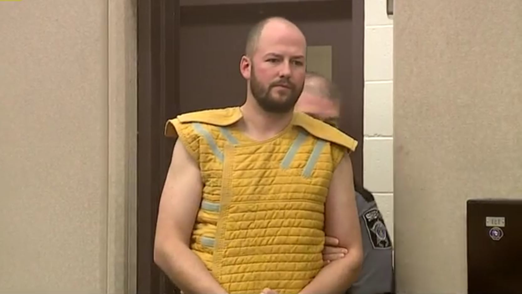 Milwaukee firefighter Michael Peden enters a Milwaukee County courtroom on Thursday, Dec. 7, 2017, to face charges of sexual assault of a female coworker.