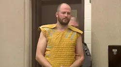 Milwaukee firefighter Michael Peden enters a Milwaukee County courtroom on Thursday, Dec. 7, 2017, to face charges of sexual assault of a female coworker.
