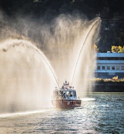 The Pittsburgh Bureau of Fire’s Lake Assault deep V-hull fireboat features a compact Hale 80FC pump flowing up to 3,000 gpm that is powered by a dedicated 6.6L Duramax V-8 diesel engine. The fire pump includes a 6-inch main discharge that feeds a number of outlets, including bow- and stern-mounted TFT Hurricane monitors, each capable of flowing 1,250 gpm. The Pittsburgh Bureau of Fire’s Lake Assault deep V-hull fireboat features a compact Hale 80FC pump flowing up to 3,000 gpm that is powered by a dedicated 6.6L Duramax V-8 diesel engine. The fire pump includes a 6-inch main discharge that feeds a number of outlets, including bow- and stern-mounted TFT Hurricane monitors, each capable of flowing 1,250 gpm.