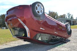 The Nissan LEAF EV assumed a nose-down position when roof-resting. The vehicle could easily be rocked forward and backward until it was stabilized. Photos by Ron Moore The Nissan LEAF EV assumed a nose-down position when roof-resting. The vehicle could easily be rocked forward and backward until it was stabilized. Photos by Ron Moore