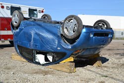 A wedging tactic with cribbing and step chocks stabilized this roof-resting Mitsubishi EV. This tactic allows for good door access, but does nothing to support the weight of the floorpan-mounted battery above the patient area A wedging tactic with cribbing and step chocks stabilized this roof-resting Mitsubishi EV. This tactic allows for good door access, but does nothing to support the weight of the floorpan-mounted battery above the patient area
