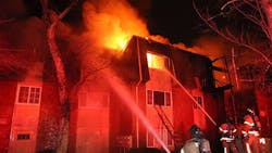 Firefighters tackle an apartment building fire in DeKalb County, GA, early Wednesday morning. Firefighters tackle an apartment building fire in DeKalb County, GA, early Wednesday morning.