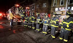 FDNY firefighters on scene at a Bronx apartment building fire Dec. 28 that has now killed 13 people after a 27-year-old man succumbed to his injuries on Thursday.