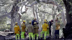 Firefighters prepare to search for the missing after a mudslide along Hot Springs Road in Montecito, CA, on Saturday, Jan. 13, 2018.