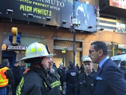 New York City Fire Commissioner Daniel Nigro, right, speaks with firefighters after a man detonated a pipe bomb near the Port Authority bus terminal on Dec. 11, 2017.