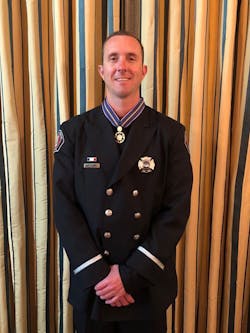 Peoria firefighter Stephen Gunn received a National Medal of Valor from President Trump. Peoria firefighter Stephen Gunn received a National Medal of Valor from President Trump.