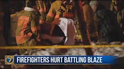 A Watertown, NY, firefighter is removed from the scene on a stretcher after being injured during a fire on Monday, Feb. 19. 2018. A Watertown, NY, firefighter is removed from the scene on a stretcher after being injured during a fire on Monday, Feb. 19. 2018.
