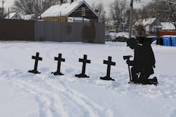 Four crosses recognize the firefighters who were were killed at the Mickelberry Foods Factory explosion. Four crosses recognize the firefighters who were were killed at the Mickelberry Foods Factory explosion.