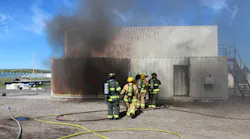 Crews conduct live-fire training in the wired burn building.