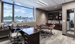 When outfitting workstations for an office, make sure that the employees back isn&rsquo;t to the door or walkway.