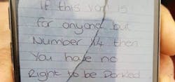 The 26-year-old woman left a threatening note on the West Midland Ambulance Service vehicle.