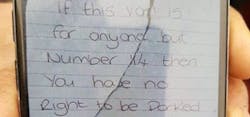 The 26-year-old woman left a threatening note on the West Midland Ambulance Service vehicle. The 26-year-old woman left a threatening note on the West Midland Ambulance Service vehicle.