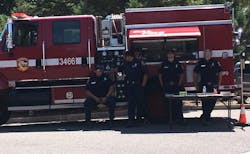 Cambria, CA, firefighters enjoy a little shade during a public event in August 2017. Cambria, CA, firefighters enjoy a little shade during a public event in August 2017.