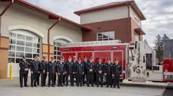 Franklin Park volunteer firefighters stand in front of their new station in Sewickley, PA, on Saturday, Feb. 17, 2018.