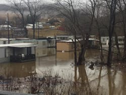 A mobile home park is flooded in Harlan, KY, on Sunday, Feb. 11, 2018.