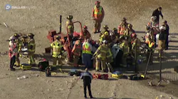 Frisco firefighters are gathered around a construction worker whose leg was mangled by heavy machinery while trauma surgeons prepare to perform an on-scene amputation last week.