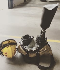 Mike Laughlin has a similar setup to his friend Brandon Anderson, leaving a second prosthesis in his fire boot so he's ready to make a quick switch when a call comes in. Mike Laughlin has a similar setup to his friend Brandon Anderson, leaving a second prosthesis in his fire boot so he's ready to make a quick switch when a call comes in.