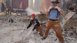 New York Firefighters work at the site of the World Trade Center on Oct. 12, 2001.