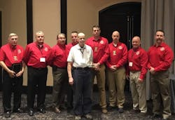 Jack Sullivan (in white) with his 2018 Dave Dodson Lifetime Service Award. Jack Sullivan (in white) with his 2018 Dave Dodson Lifetime Service Award.