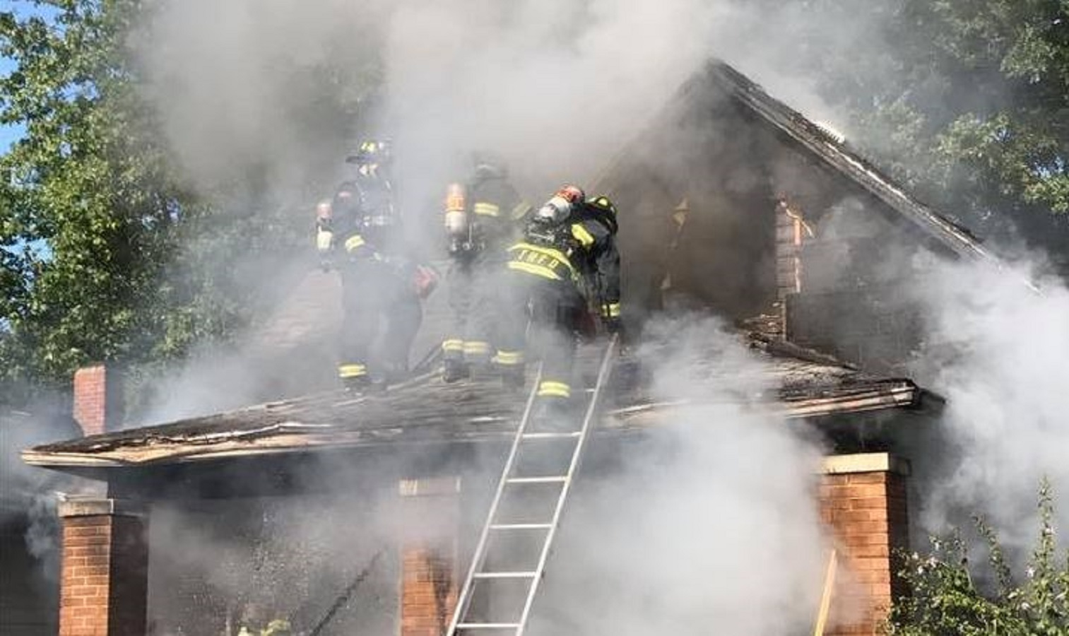 Terre Haute, IN, firefighters tackle a house fire on Aug. 9, 2017.