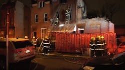 Philadelphia crews on scene during a rowhouse fire early Wednesday that left one man dead and injured two firefighters. Philadelphia crews on scene during a rowhouse fire early Wednesday that left one man dead and injured two firefighters.