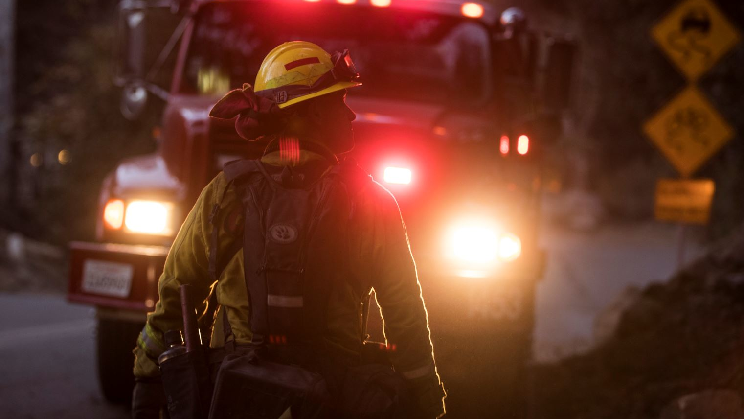 Cal Fire engineer Jim Whitlock keeps an eye on his crew mopping up Thomas fire hot spots along East Mountain Drive in Montecito, CA, on Dec. 20, 2017.
