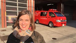 Syracuse, NY, District Fire Chief Sara Errington in front of a firehouse on a recent trip to Japan. Syracuse, NY, District Fire Chief Sara Errington in front of a firehouse on a recent trip to Japan.