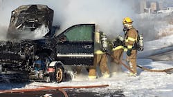 Maplewood, MN, firefighters tackle a vehicle fire in December 2016.