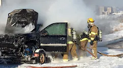 Maplewood, MN, firefighters tackle a vehicle fire in 2016. Maplewood, MN, firefighters tackle a vehicle fire in 2016.