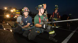 New City, NY, probationary firefighter Will McCue works a hose line during training.