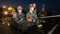 New City, NY, probationary firefighter Will McCue works a hose line during training. New City, NY, probationary firefighter Will McCue works a hose line during training.