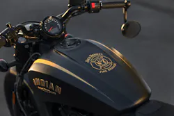 The bike has subtle two-tone matte black paint and is covered in real 24-karat gold graphics, including the Fire Brigade emblem on the tank. Image courtesy Indian Motorcycle