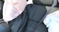 When the GM center-seat airbag deploys, it occupies the area between the driver and front-seat passenger to minimize physical contact during a side collision. The bag will remain firm for several minutes.
